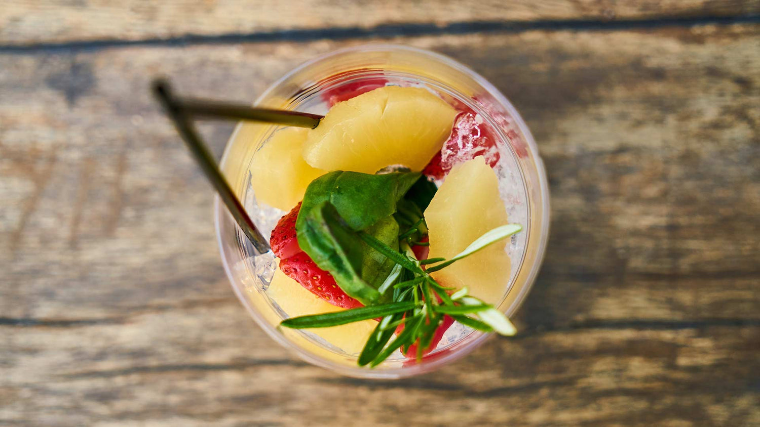 Infused water with fresh fruit - pineapple and strawberries